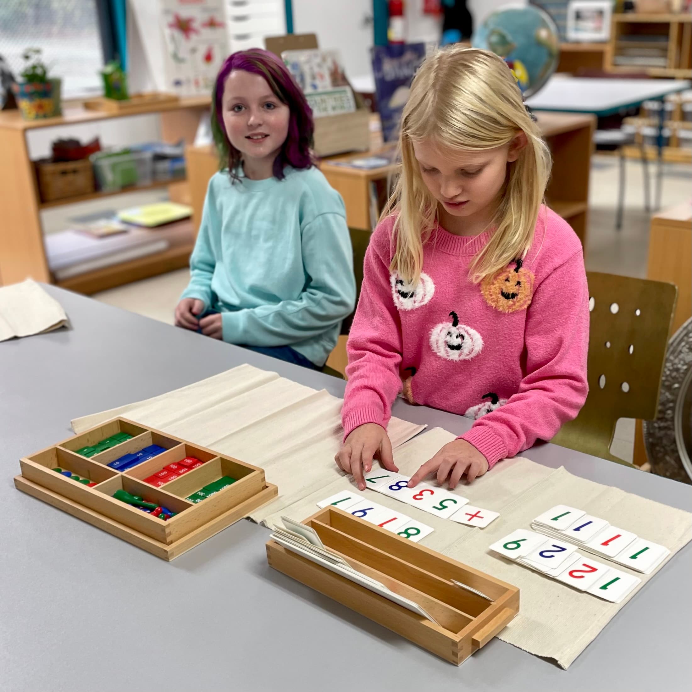 Children engaged in creative Montessori activities