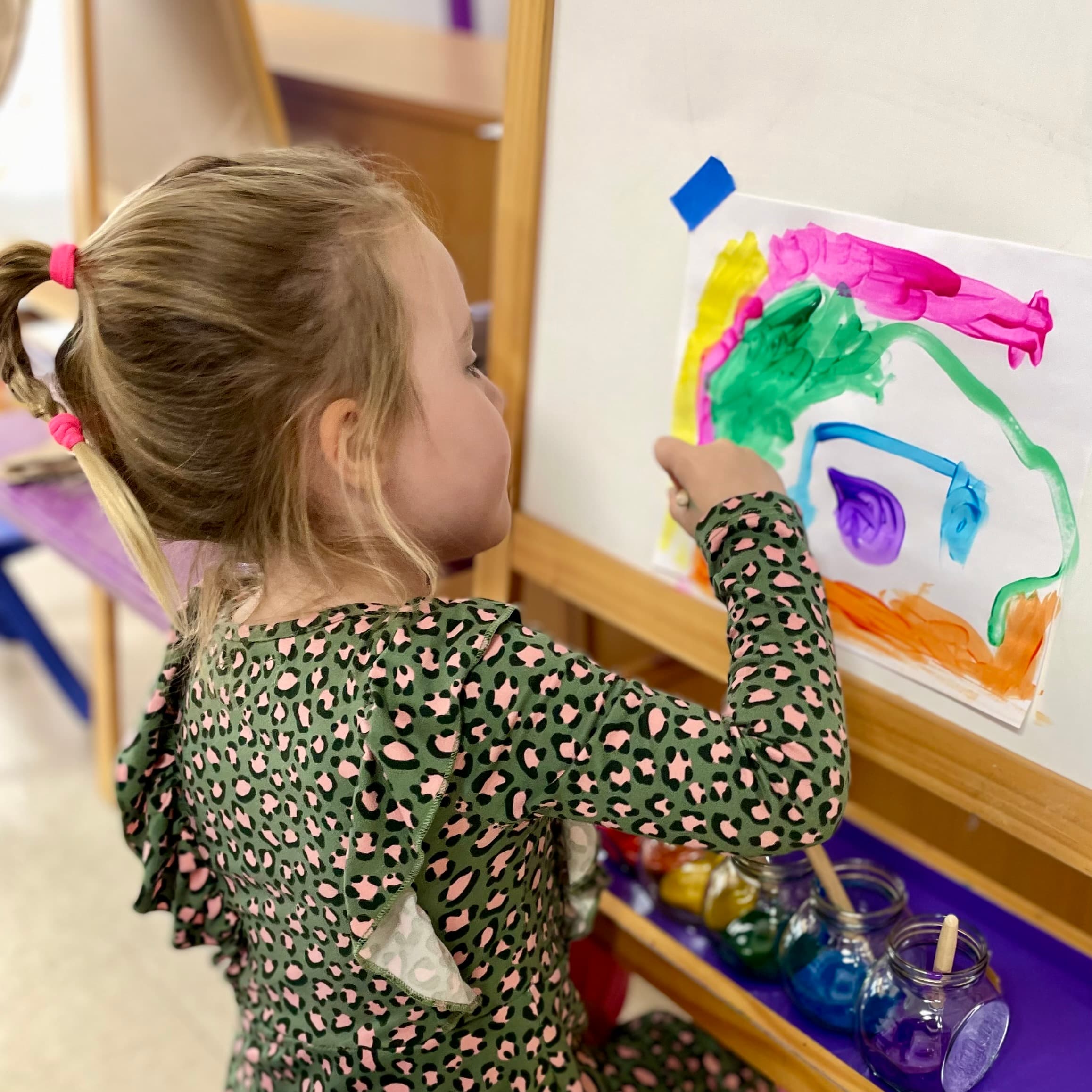 Young learners exploring in the classroom